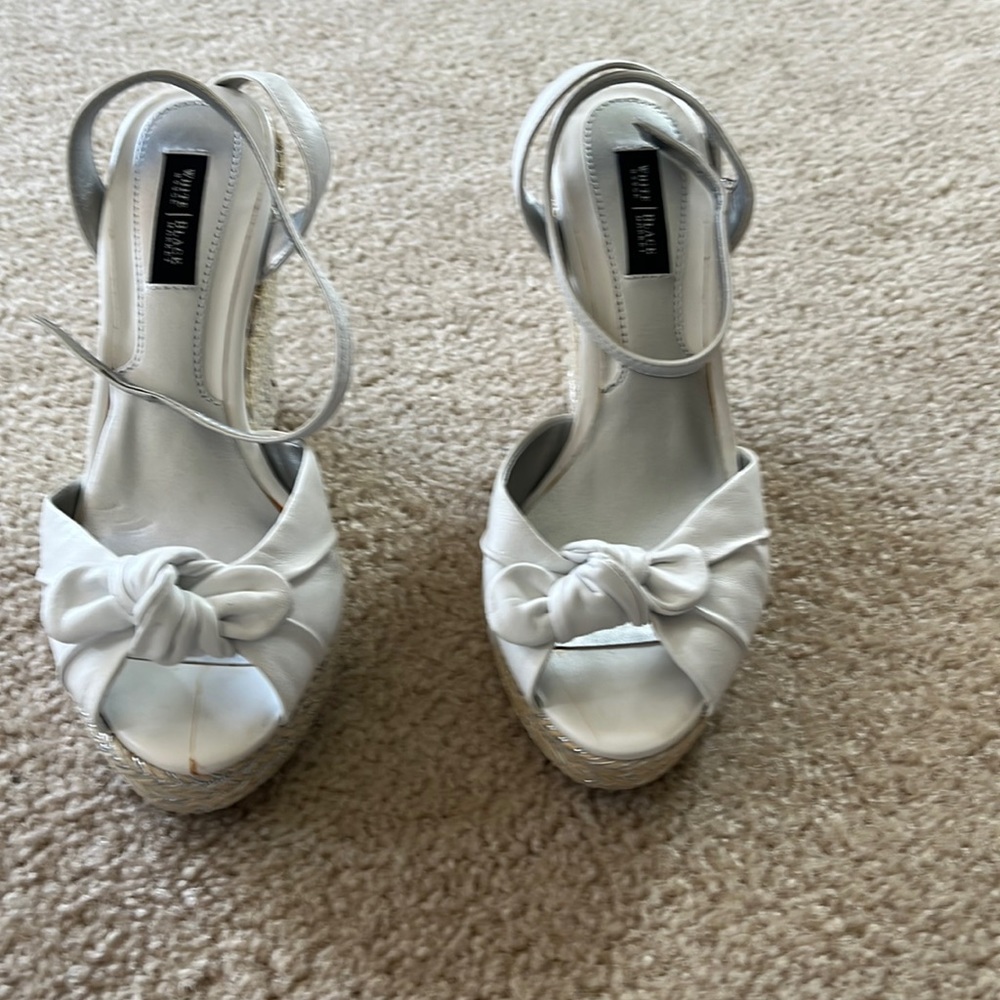 White open toed espadrilles. Ankle strap and bow.